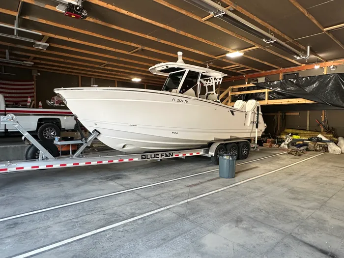 Centre console fishing boat detailed under cover