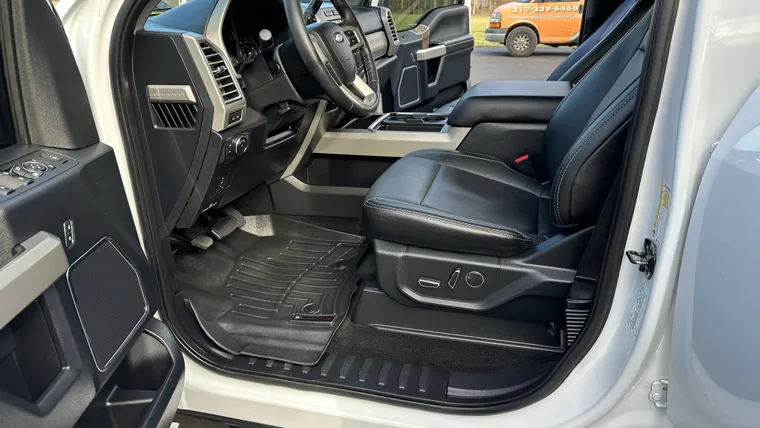 Fully detailed Ford Super Duty cabin with cleaned leather and floor mats